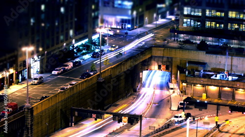 Time lapse of traffic passing through the streets of New York at night photo
