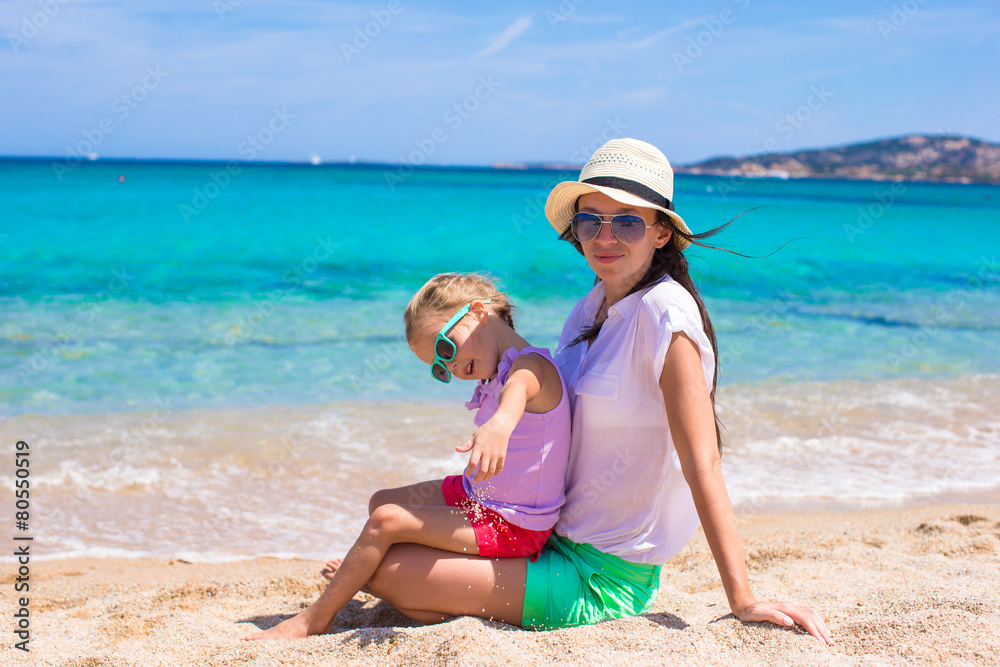 Young mother and her adorable little daughter during summer Young mother and her adorable little daughter during summer