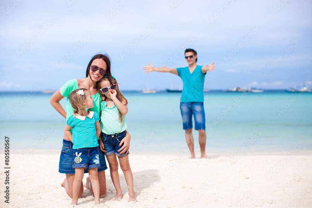 Happy family of four during summer vacation Happy family of four during summer vacation