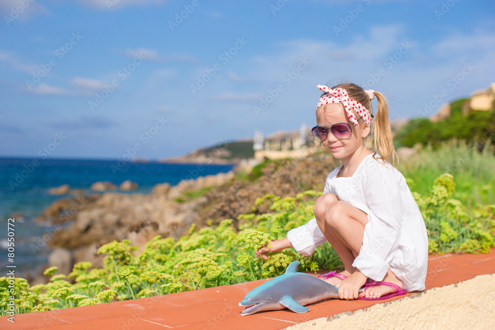 Adorable little girl outdoors during summer vacation