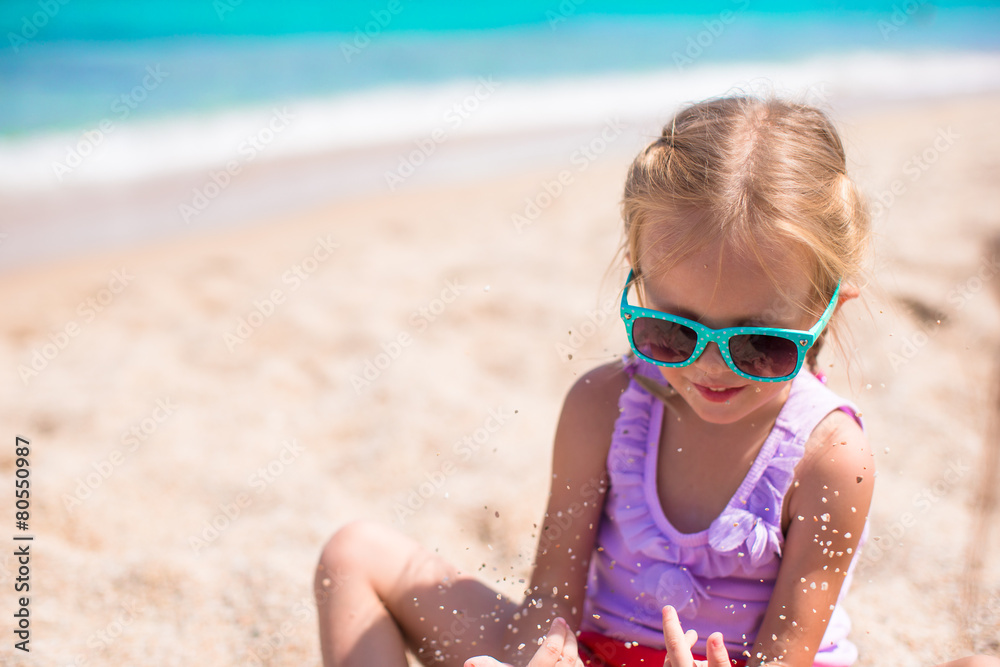 Adorable little girl outdoors during summer vacation Adorable little girl outdoors during summer vacation