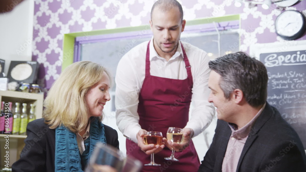 Mature couple in love drinking wine together in a cafe Mature couple in love drinking wine together in a cafe