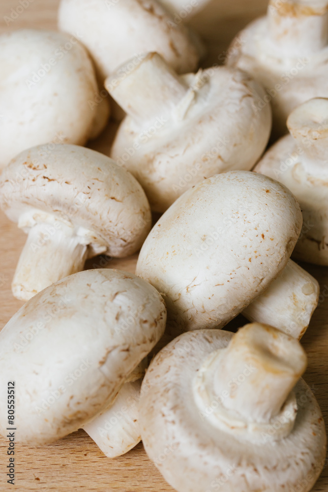 mushrooms on wooden background