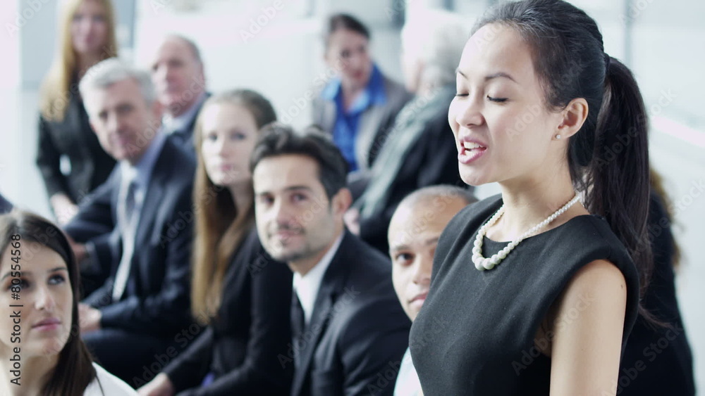 Diverse group of business people attend a business seminar Diverse group of business people attend a business seminar