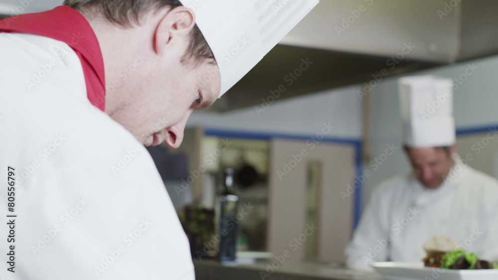 Delicious gourmet dish is being given the finishing touches by the chef Delicious gourmet dish is being given the finishing touches by the chef