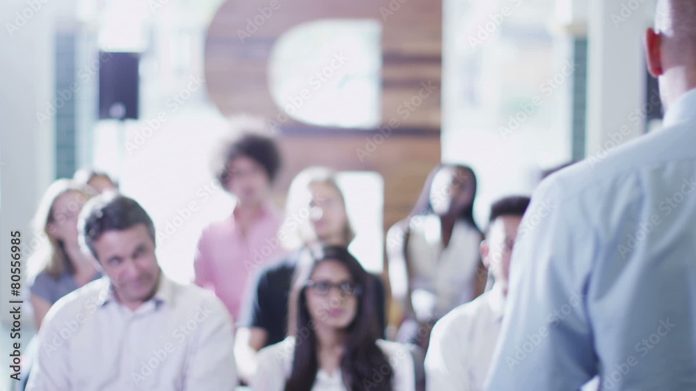 Cheerful diverse business group at business presentation or training seminar