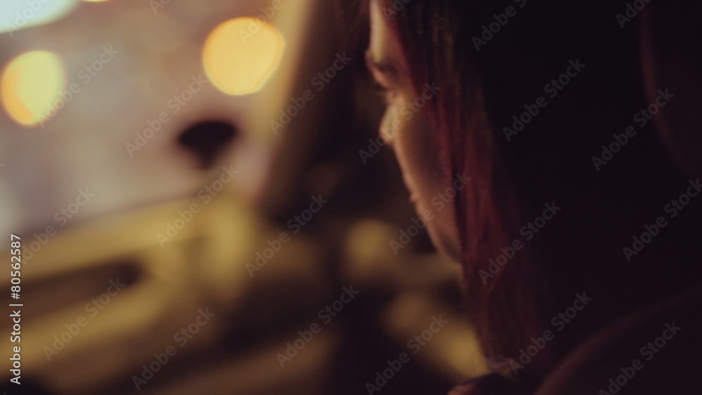 Asian girl in the passenger seat of car at night Asian girl in the passenger seat of car at night