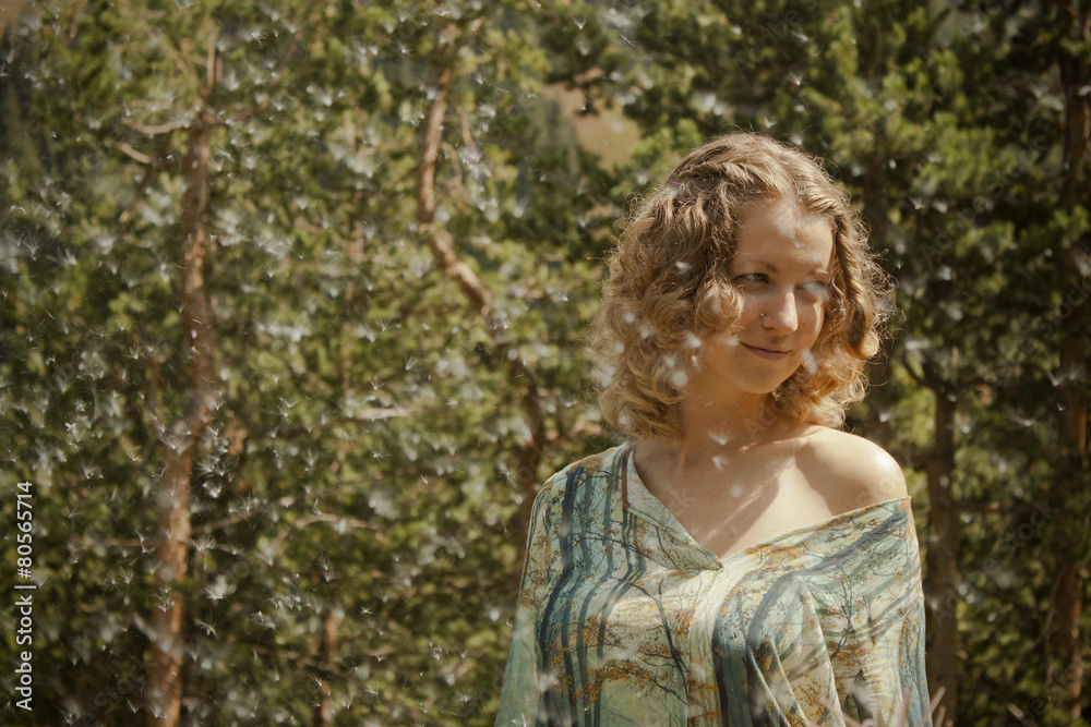 Lady in mountain with dandelion Lady in mountain with dandelion