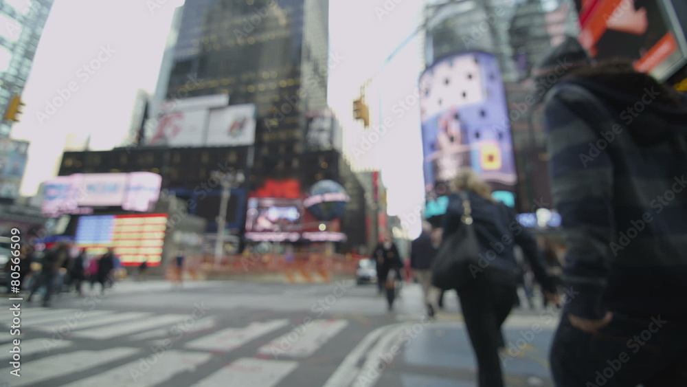 Crowds of tourists gather at Times Square in New York City Crowds of tourists gather at Times Square in New York City