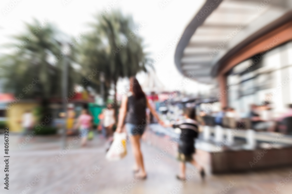 Motion blurred people in the shopping center
