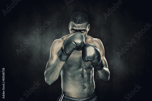 Composite image of muscular boxer © WavebreakMediaMicro