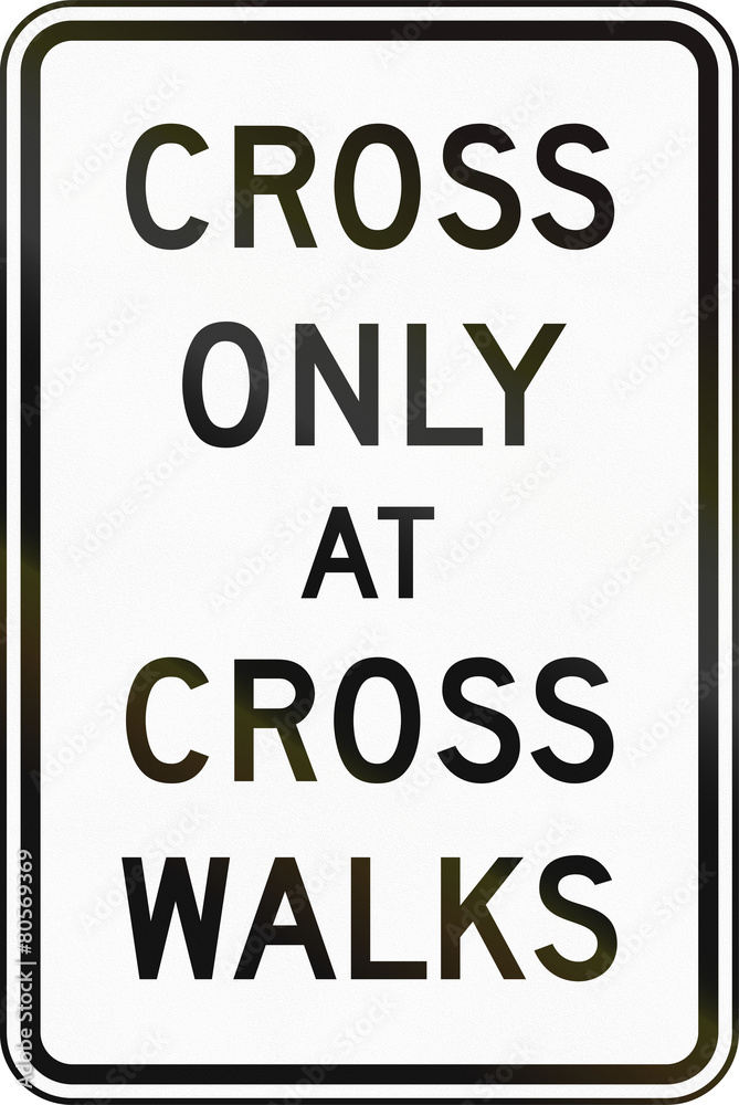 United States traffic sign: Cross only at cross walks