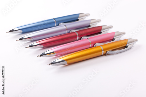 Ballpoint pens on table