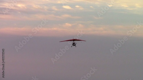 Ultralight flying at sunset near Pokhara in Nepal
