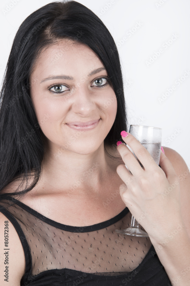 Woman celebrating new year with a glass of champane Woman celebrating new year with a glass of champane