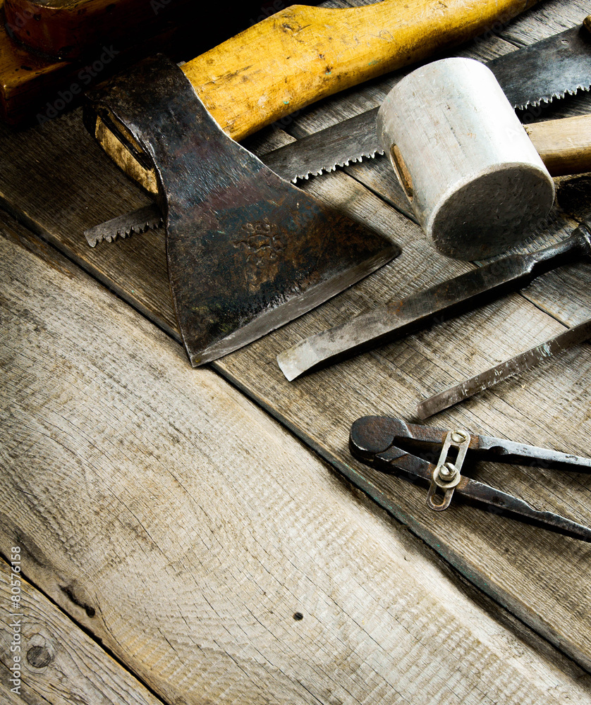 Various tools on a wooden background.