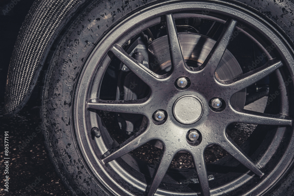 Sport car wheel on race track Sport car wheel on race track