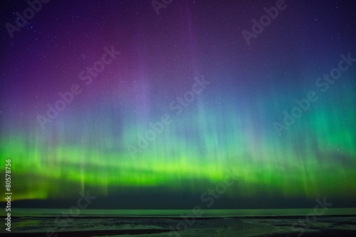Beautiful Aurora Borealis over sea photo