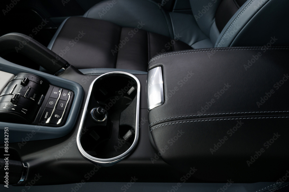 Modern car lather armrest. Interior detail.