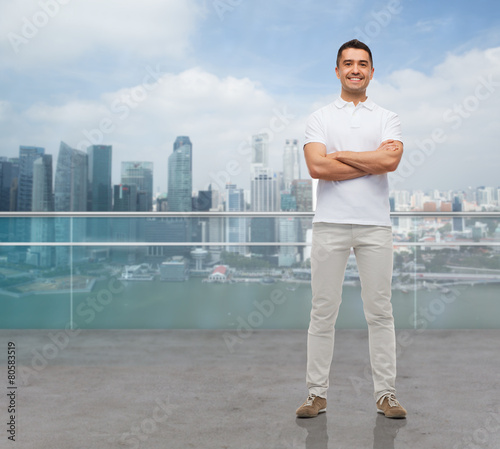 Photography smiling man with crossed arms