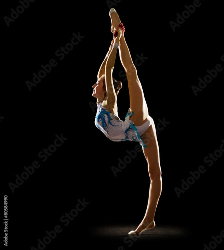 Young girl engaged art gymnastic