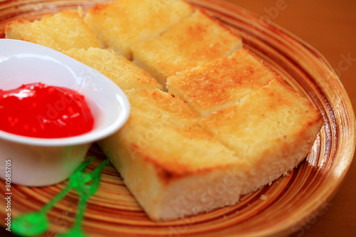 Toast bread and strawberry jam.