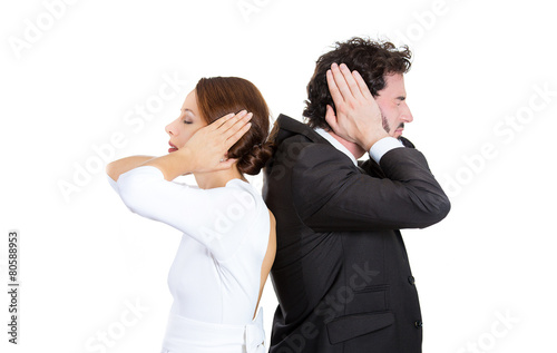 man woman couple standing with backs together covering ears © pathdoc