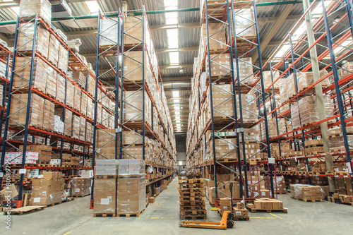 Fototapeta warehouse shelves with goods