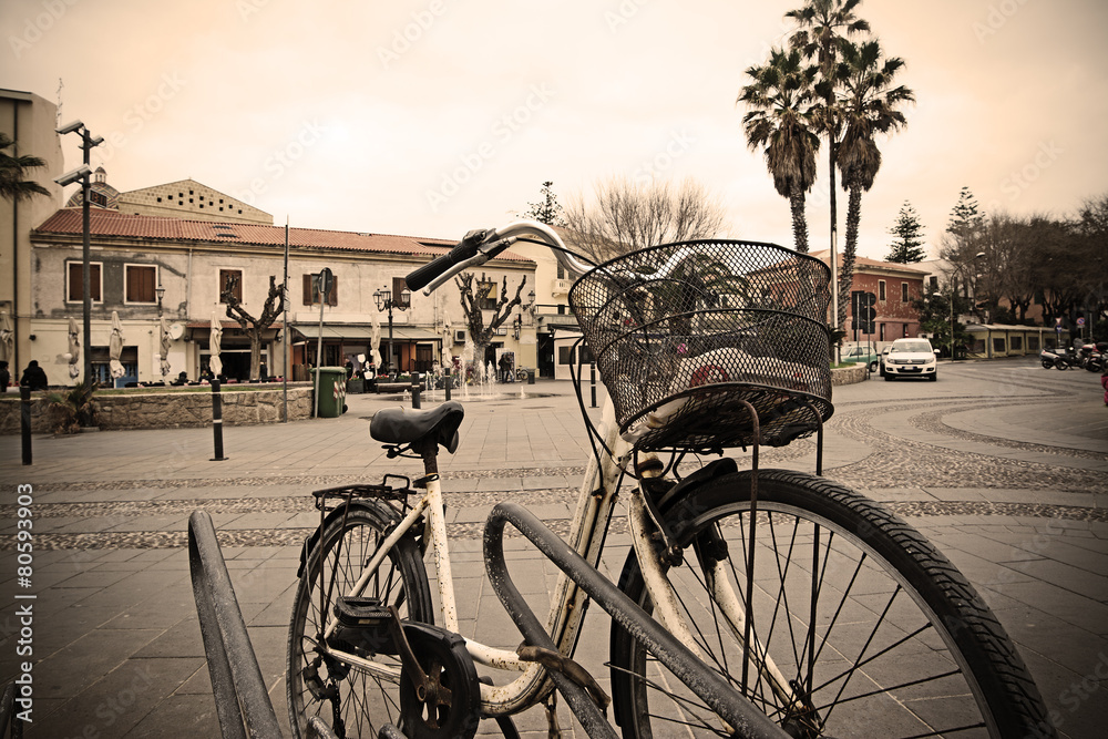 old bicycle parked in an Italian square