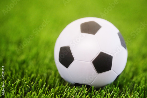 Closeup soccer ball on soccer field