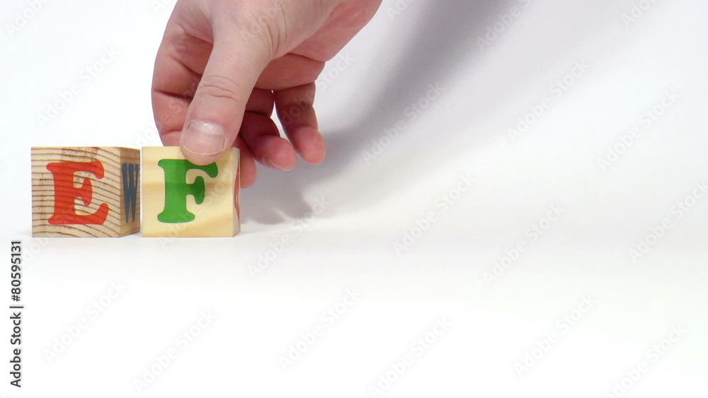 The video shows effort word built of wooden blocks The video shows effort word built of wooden blocks