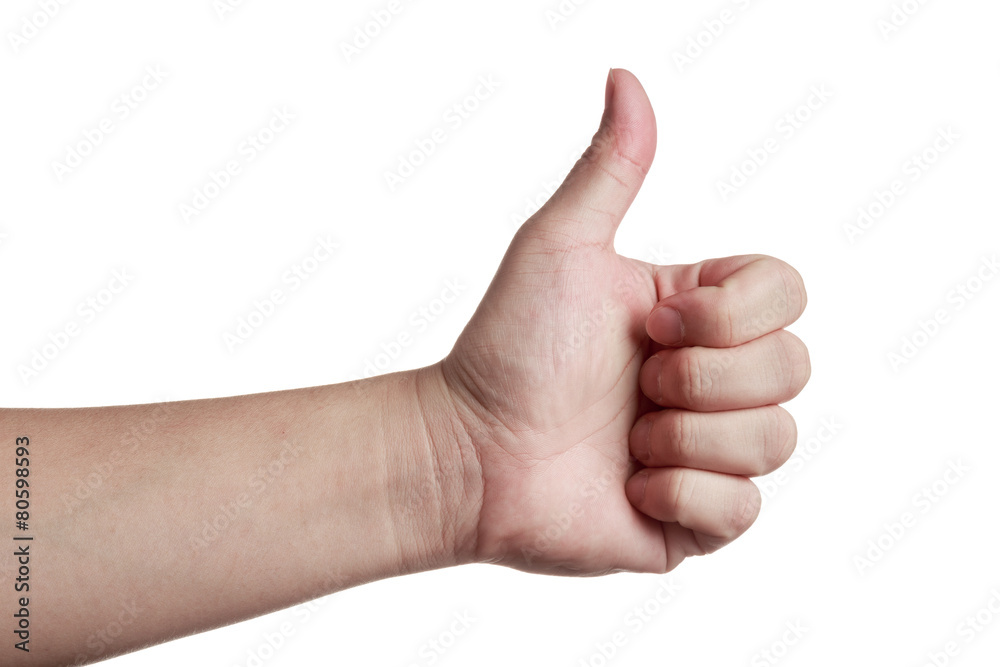 Thumbs up by an asian hand isolated Thumbs up by an asian hand isolated