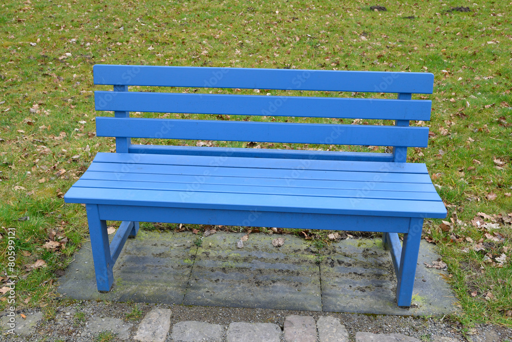 Blue bench in the park Blue bench in the park