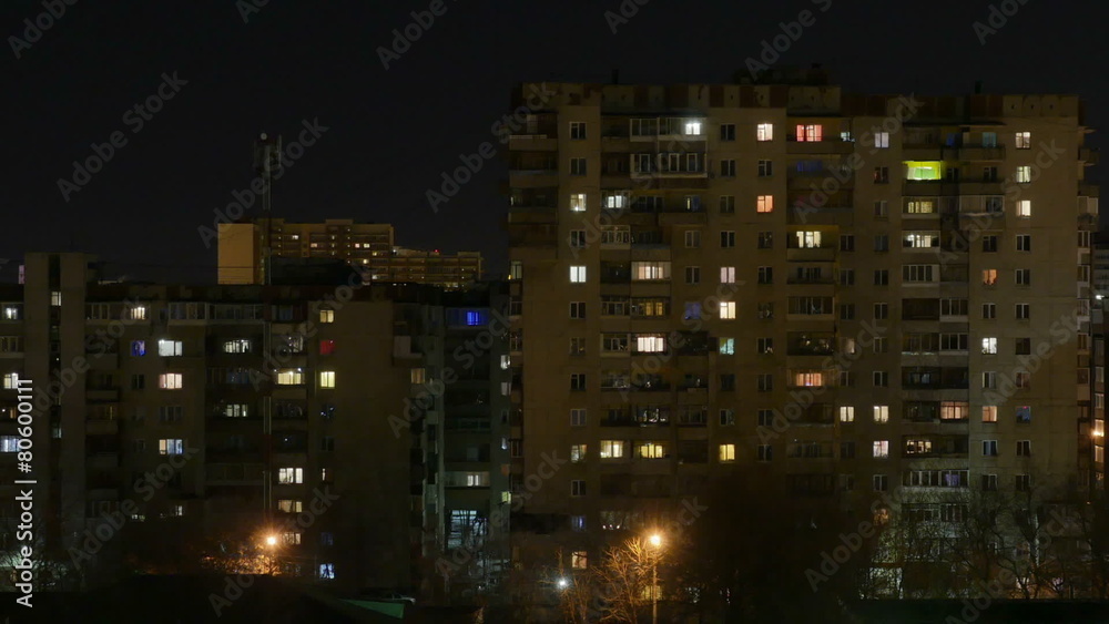 Night city. The light in the Windows of tall buildings Night city. The light in the Windows of tall buildings