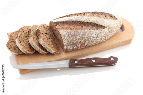 Loaf and slices of rye bread on a cutting Boards isolate