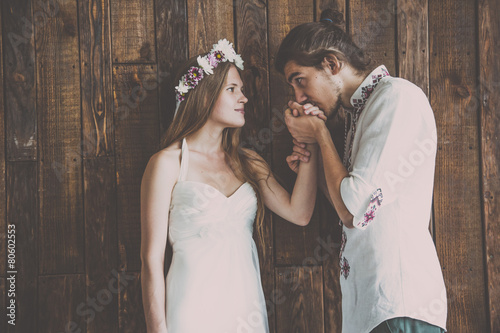 beautiful bride and groom are having a good time rustic style