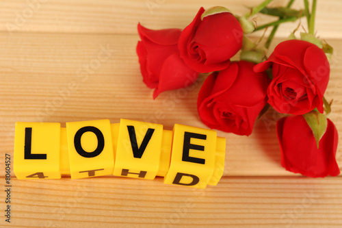 Decorative letters forming word LOVE with flowers