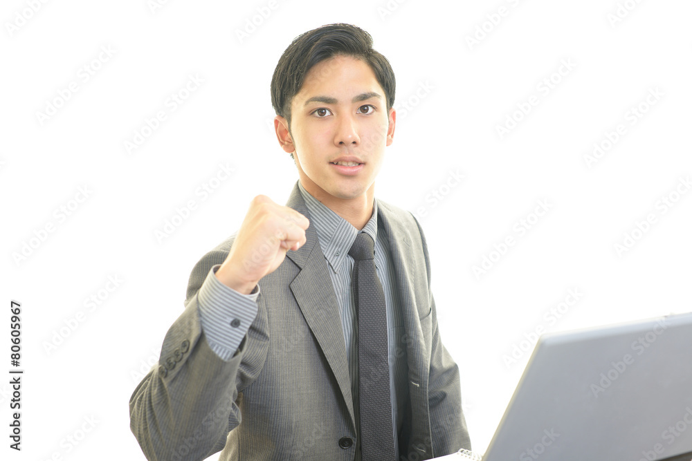 ガッツポーズのビジネスマン