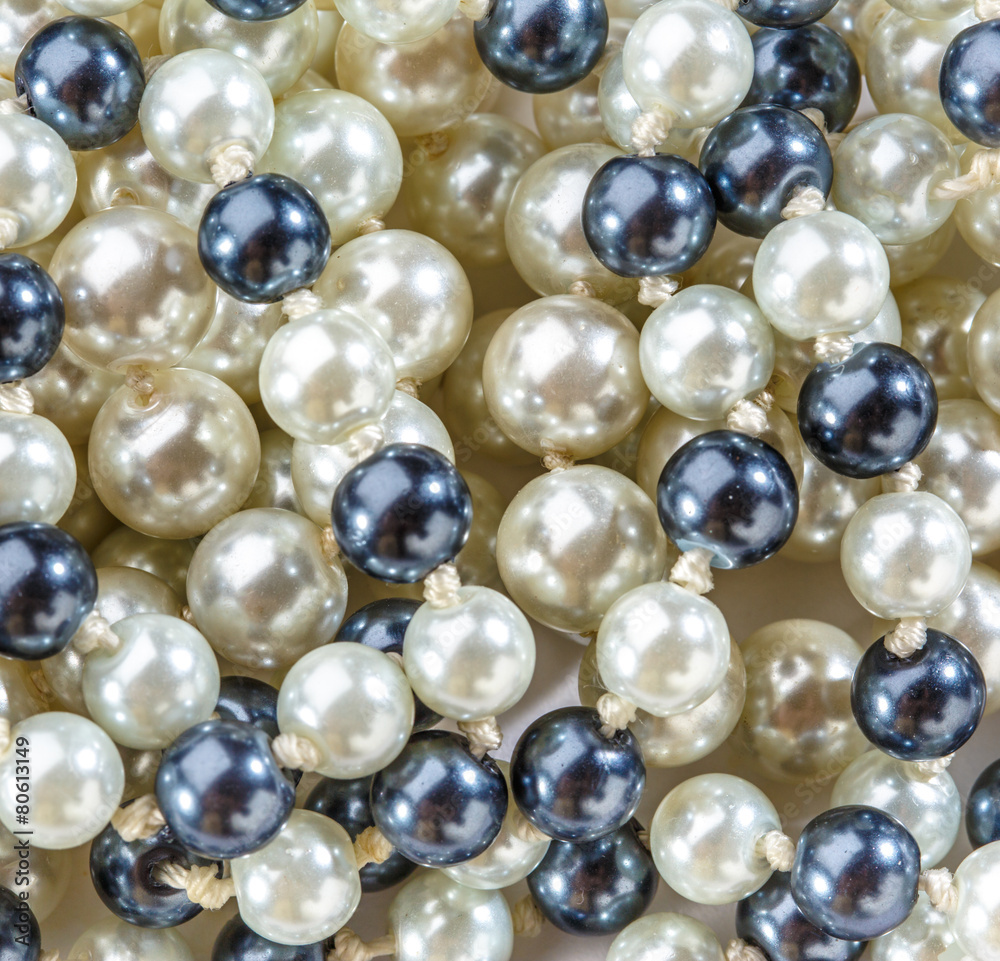 String of black and white pearls String of black and white pearls