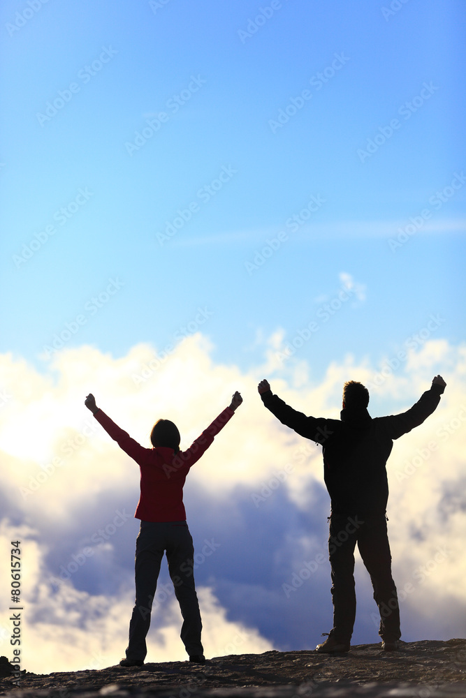 Happy hikers reaching life goal - success people Happy hikers reaching life goal - success people
