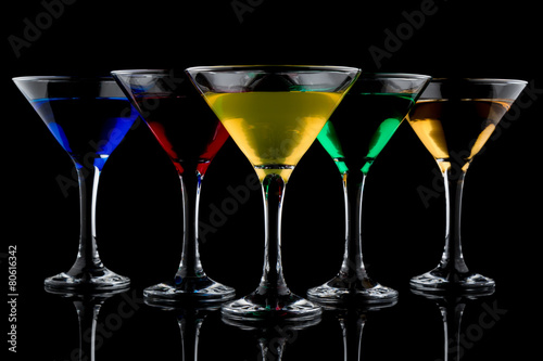 color cocktails in martini glasses