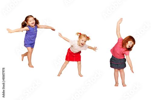 Happy dancing kids. Isolated on white