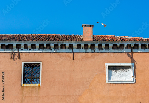 Beautiful venetian windows of a typical Venetian house, Italy © GoodPics