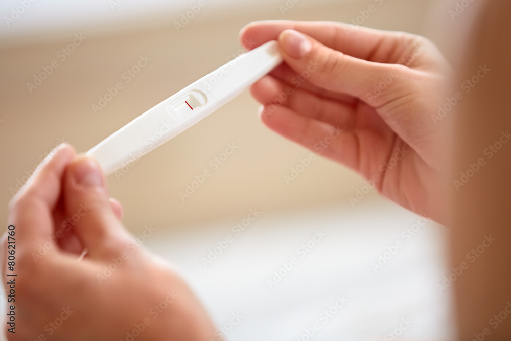 Woman Holding Pregnancy Test Woman Holding Pregnancy Test