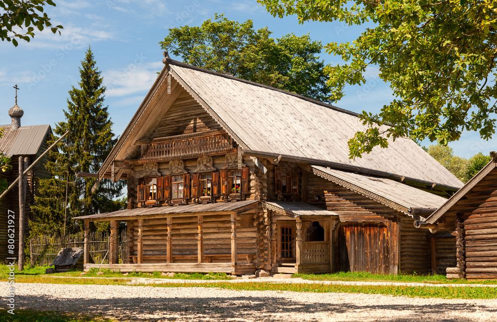 Traditional russian old wooden house in the ancient town of Novg Traditional russian old wooden house in the ancient town of Novg