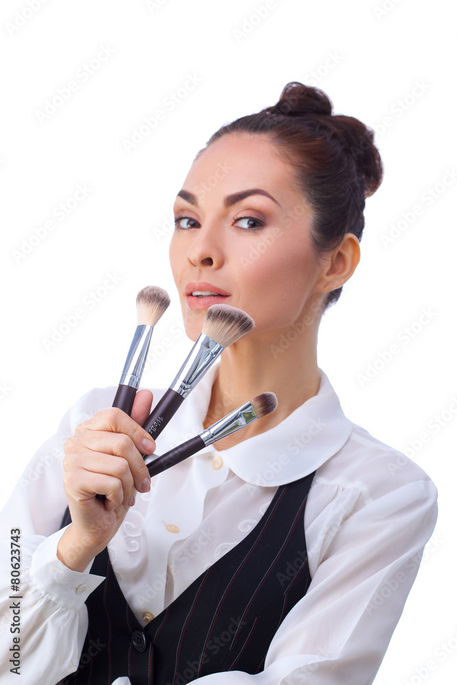 Woman with makeup brushes. All isolated on white background. Woman with makeup brushes. All isolated on white background.