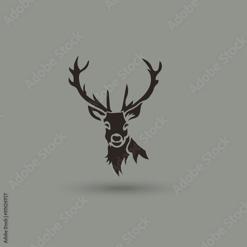 Artistic vector silhouette of a deer. Creative idea logotype.