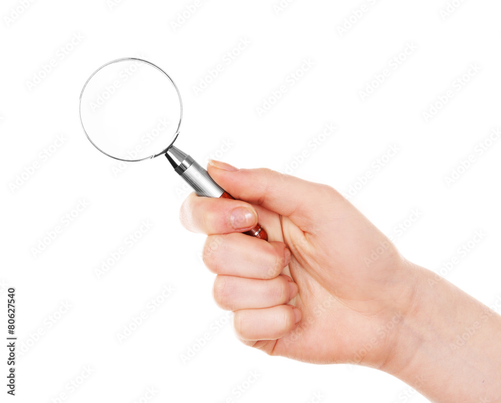 Female hand with magnifying glass isolated on white Female hand with magnifying glass isolated on white
