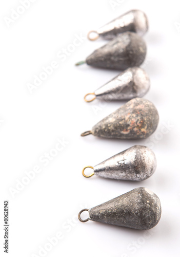 Fishing sinker or knoch over white background photo