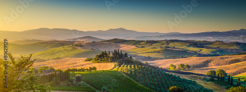 Tuscany landscape panorama at sunrise, Val d'Orcia, Italy photo